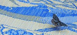Butterfly landing on a mat in Vang Vieng, Laos