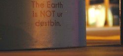 Trash Can in Singapore Trash can with green message in Singapore