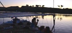 Tourists on a felucca Nile river sailboat in Egypt