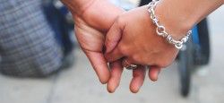 Couple holding hands in Austin, TX