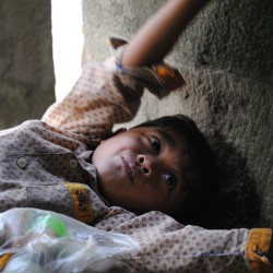 Sleepy Homeless Child in Cambodia