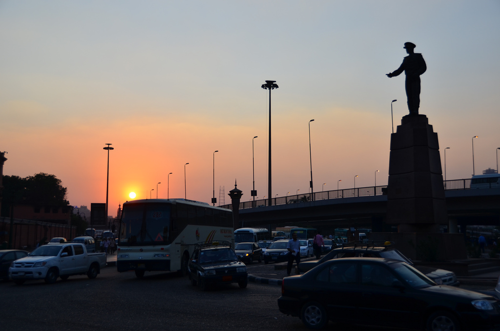 The sun sets over a busy day in Cairo