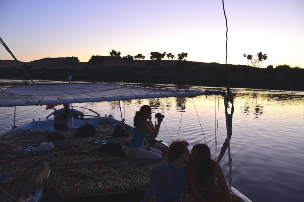 Tourists on a felucca Nile river sailboat in Egypt