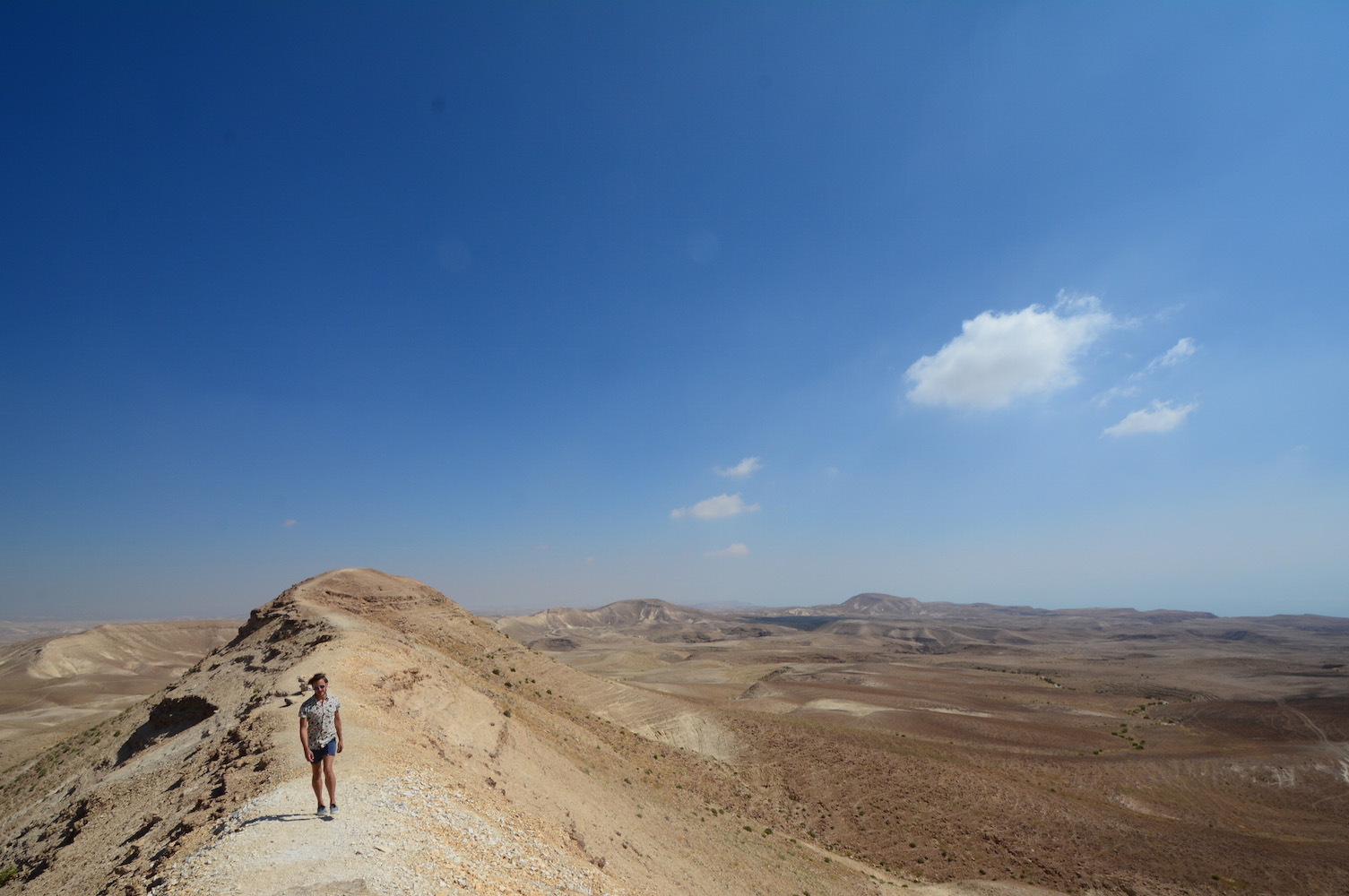 Robert Schrader hiking on a mountain ride in Judean desert