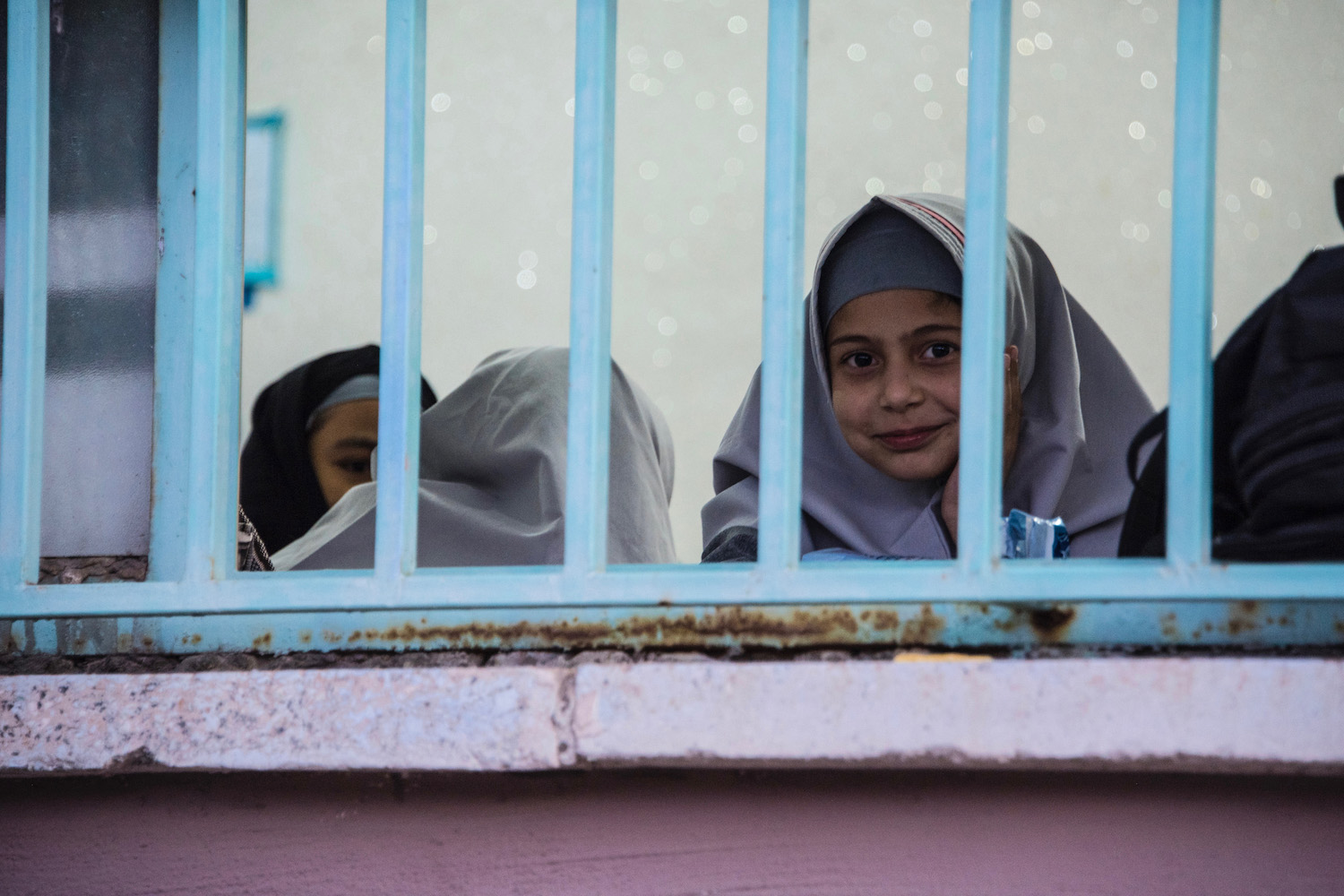 Iran travel pictures young Iranian girl wearing chador